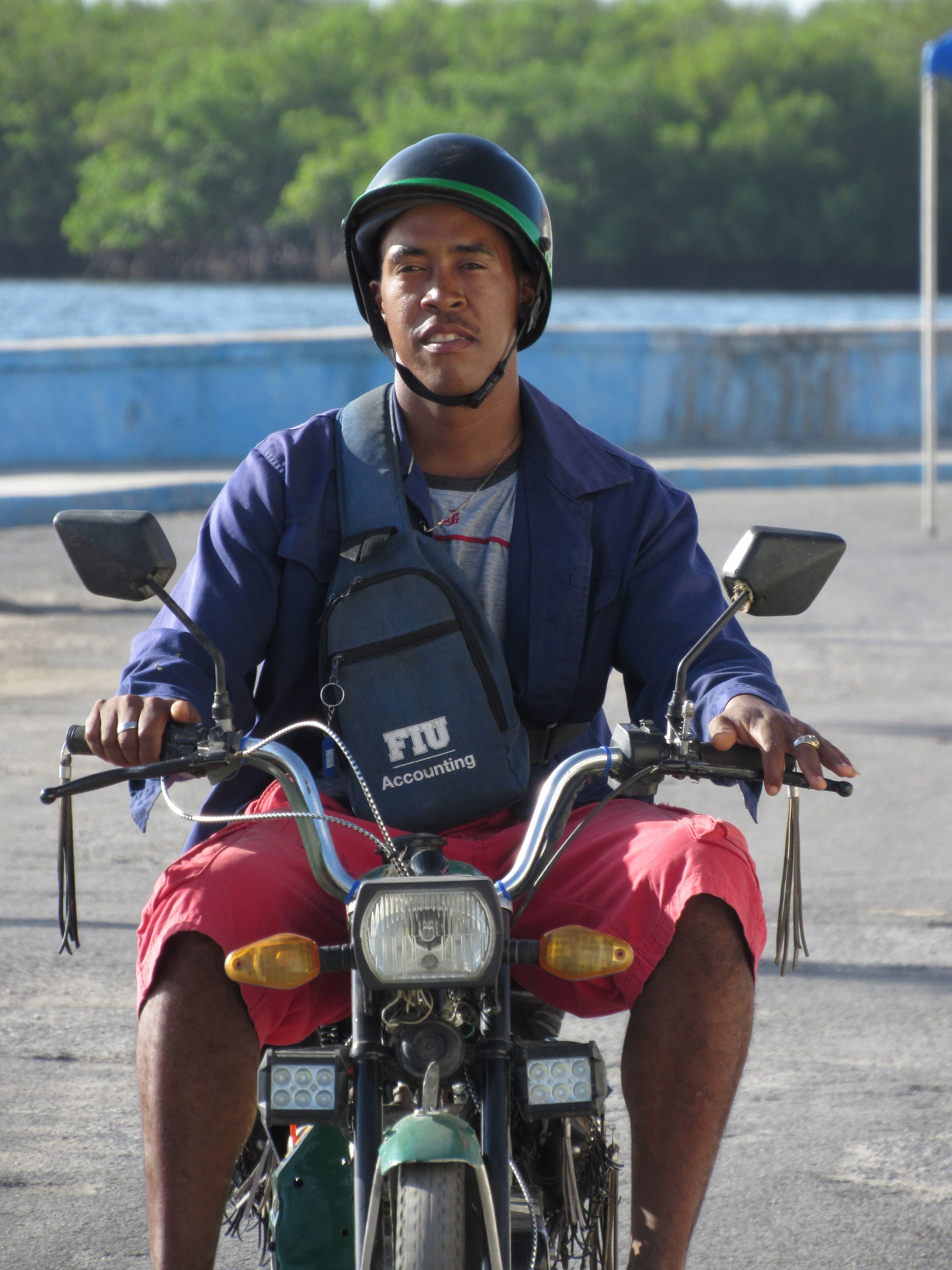Man Riding Motorcycle by Waterfront · Free Stock Photo