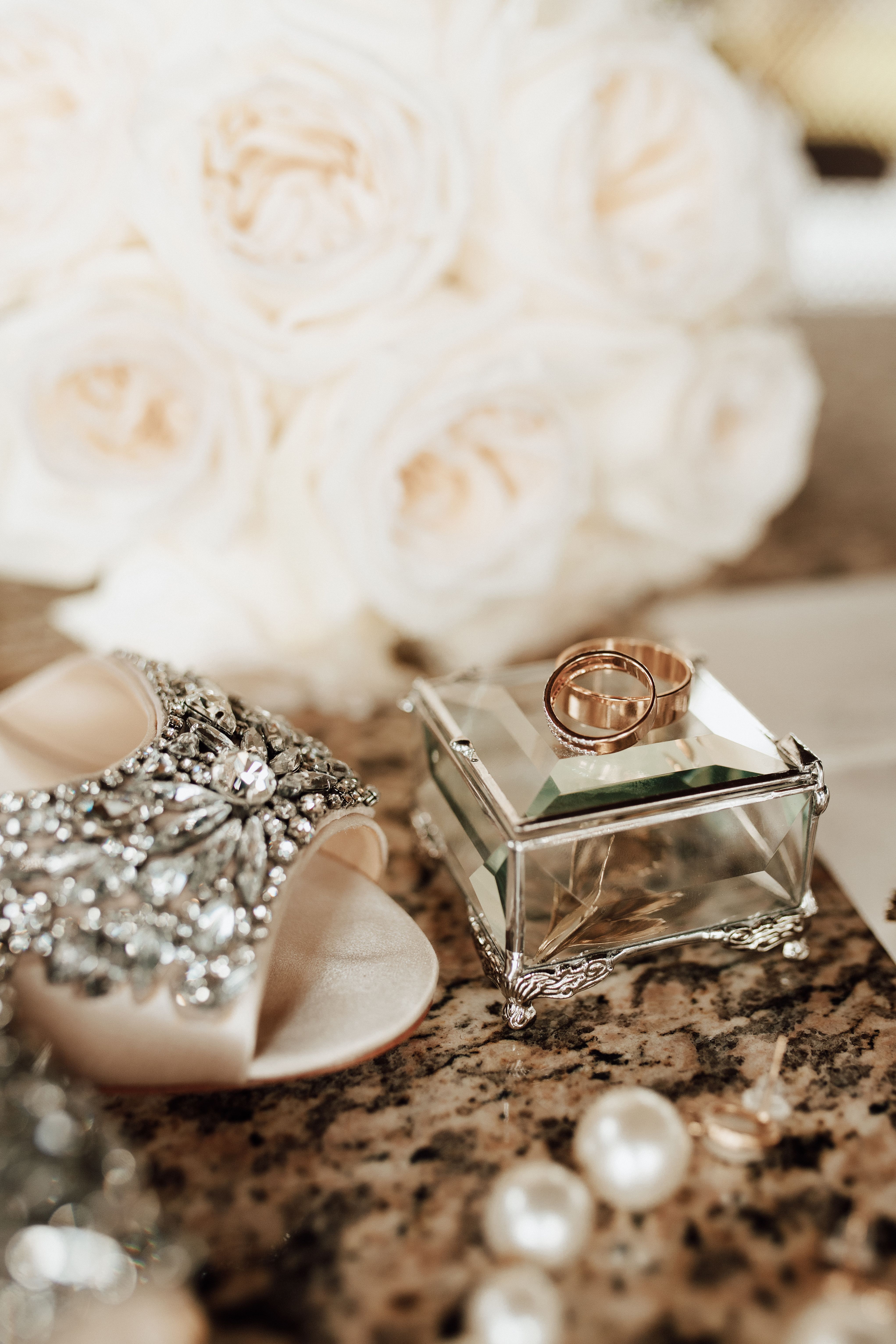 Elegant Bridal Accessories with Wedding Rings · Free Stock Photo
