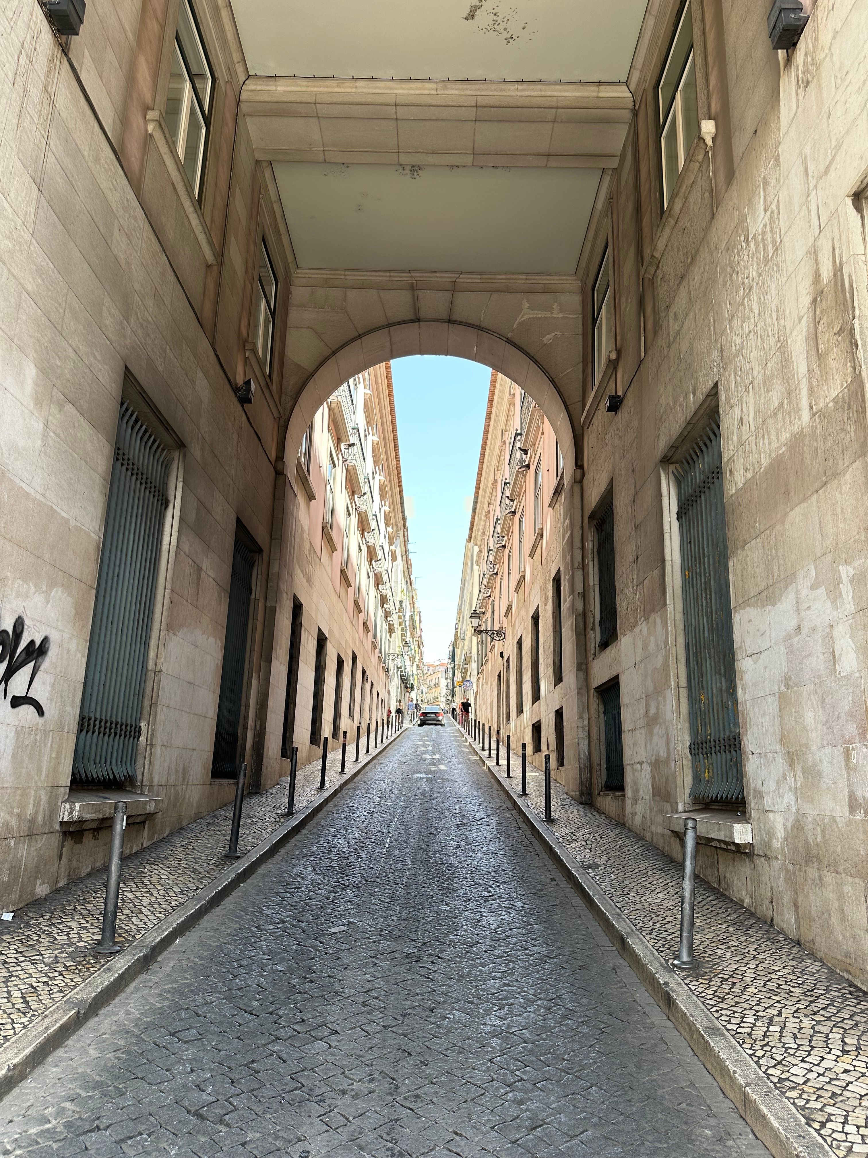 Historic Archway View in Lisbon Street · Free Stock Photo