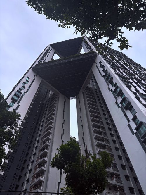 Free Stunning view of modern high-rise architecture in Singapore with a sky bridge. Stock Photo