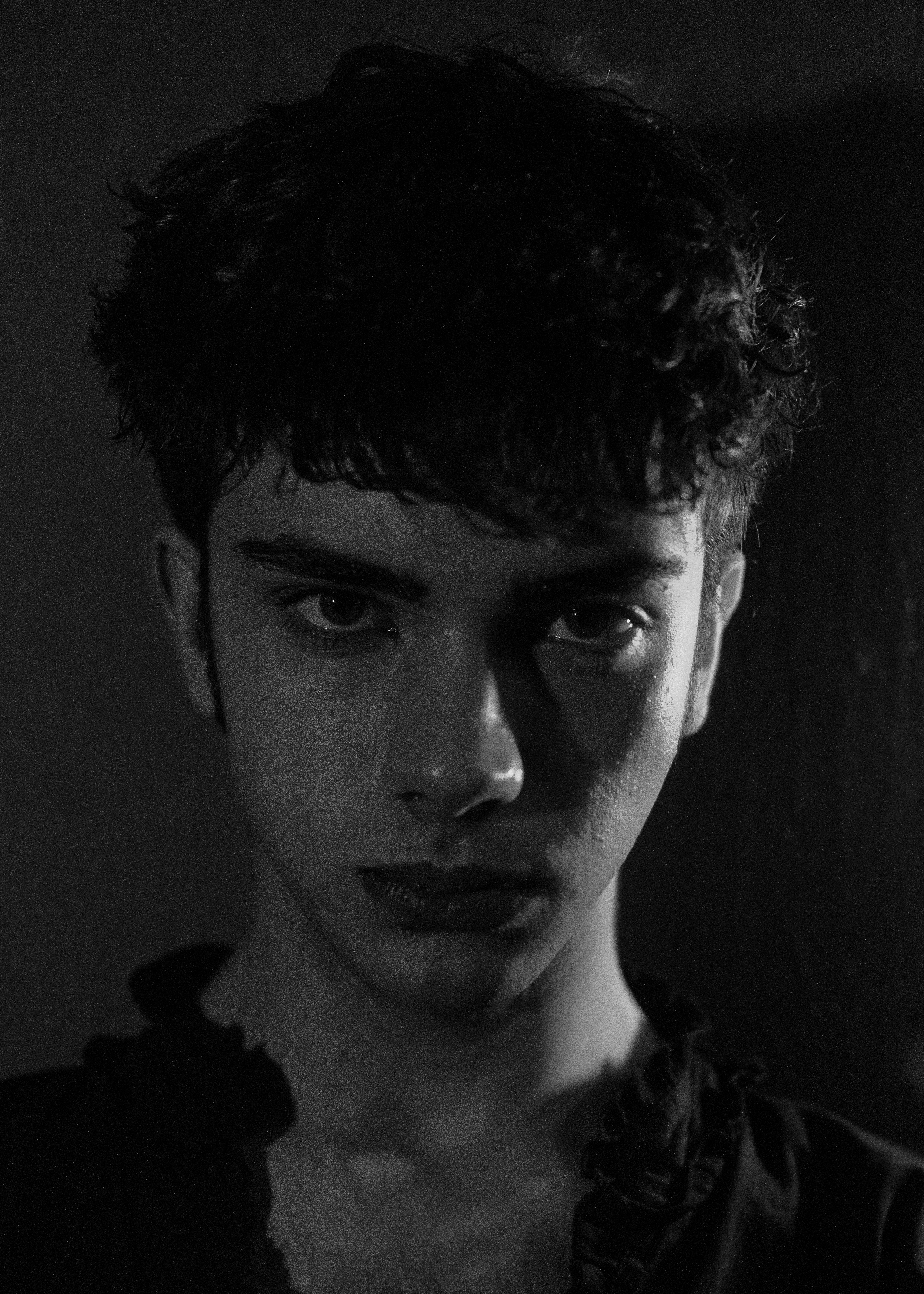 Dramatic Black and White Portrait of a Young Man · Free Stock Photo