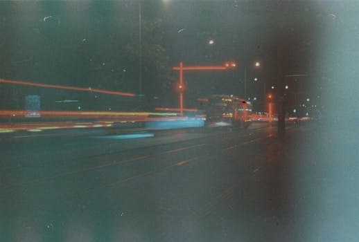 Capture of Izmir's vibrant nightlife using film photography and dynamic light trails.