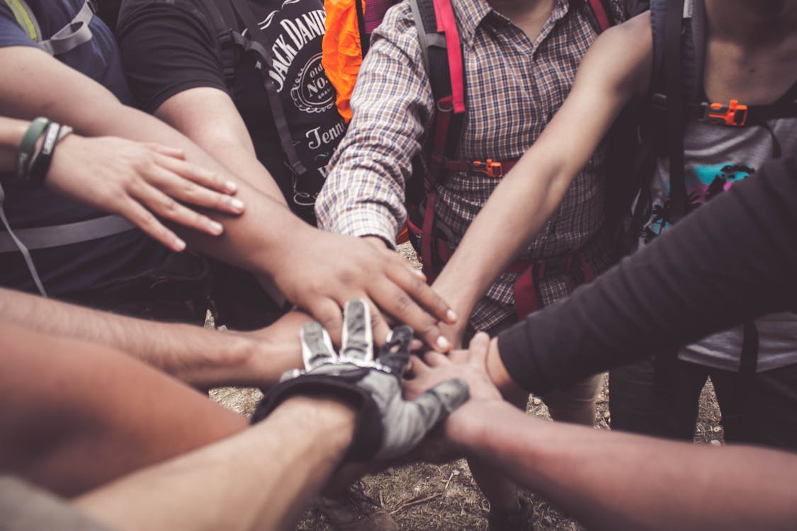 Free People Doing Group Hand Cheer Stock Photo