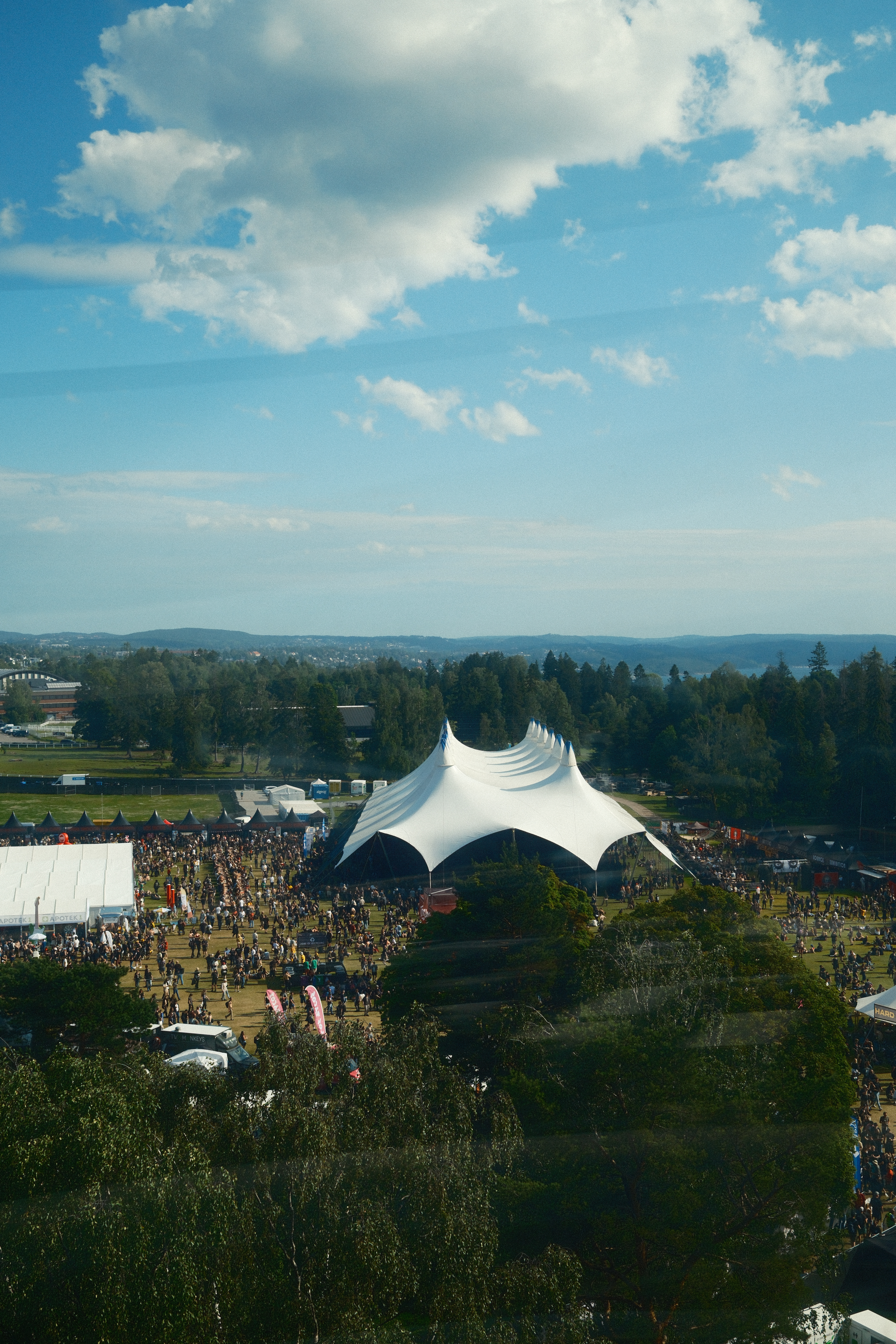 Aerial View of Outdoor Music Festival with Tents · Free Stock Photo