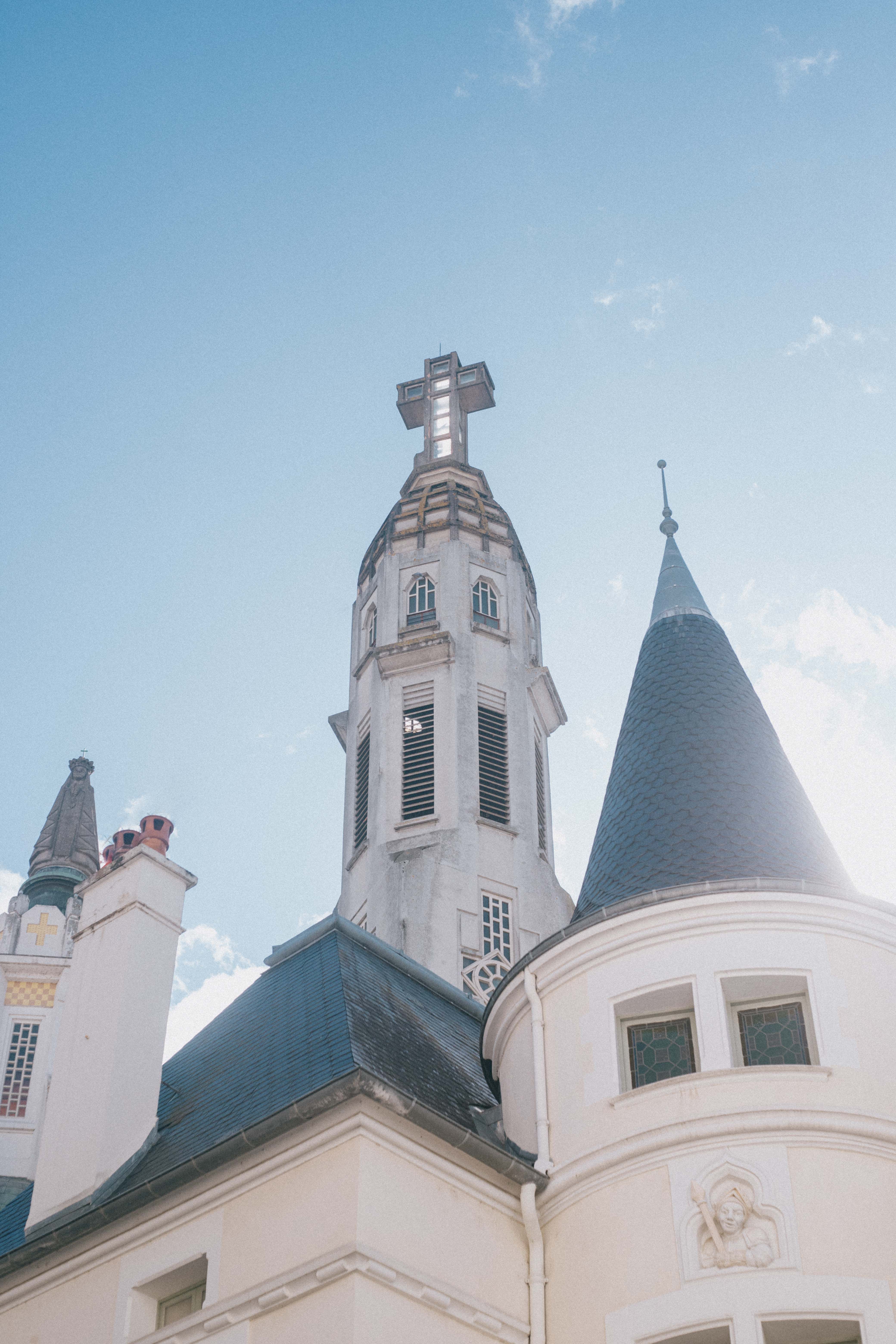 Historic Church Spire Against Clear Sky · Free Stock Photo