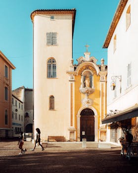 Explore the picturesque streets of Vence, France, showcasing historic architecture and vibrant streetscape.