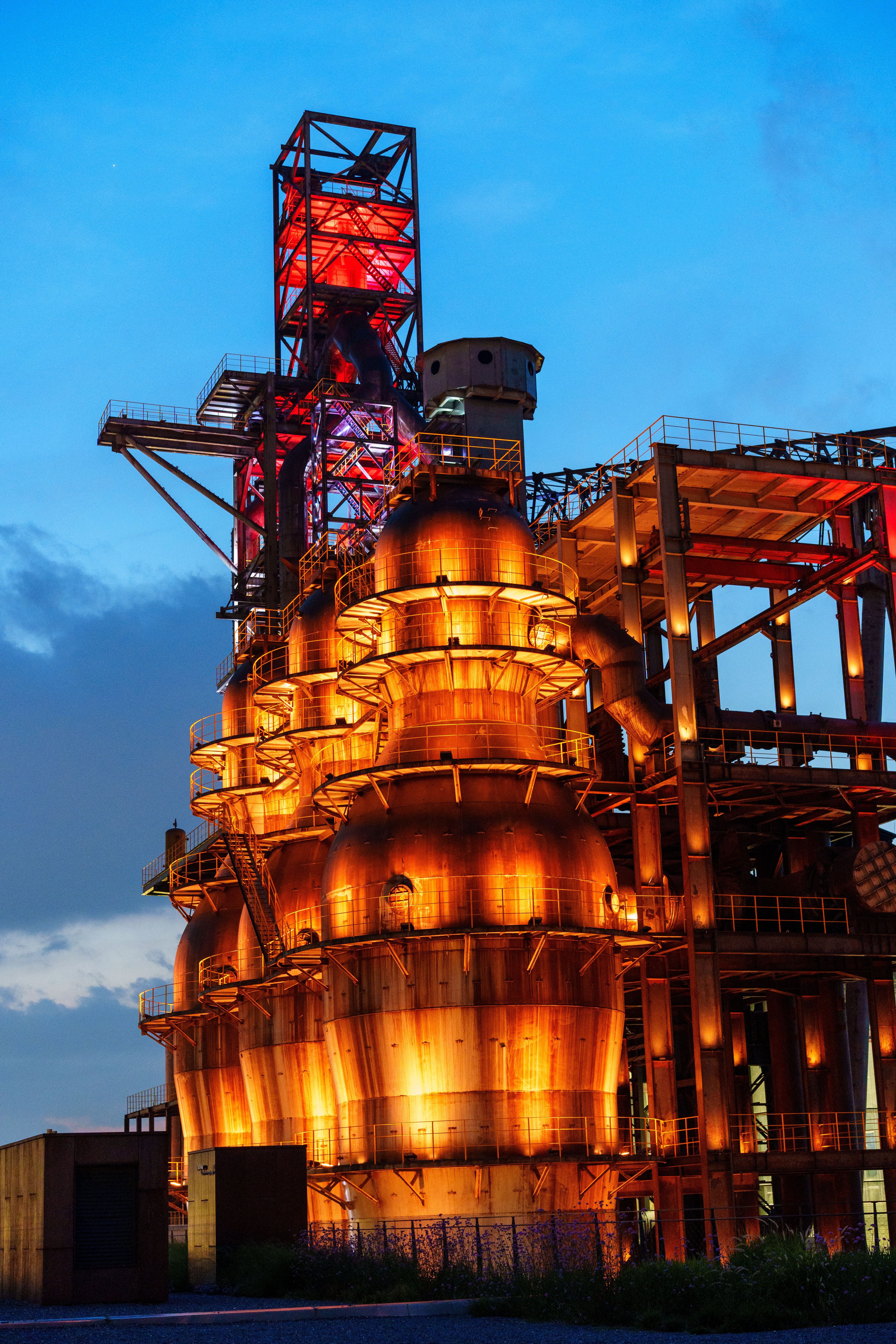 Illuminated Industrial Structure at Dusk · Free Stock Photo
