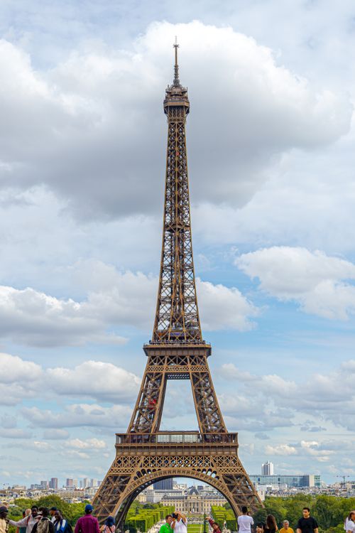 Free Stunning view of the Eiffel Tower with a cloudy sky in Paris, France. Stock Photo