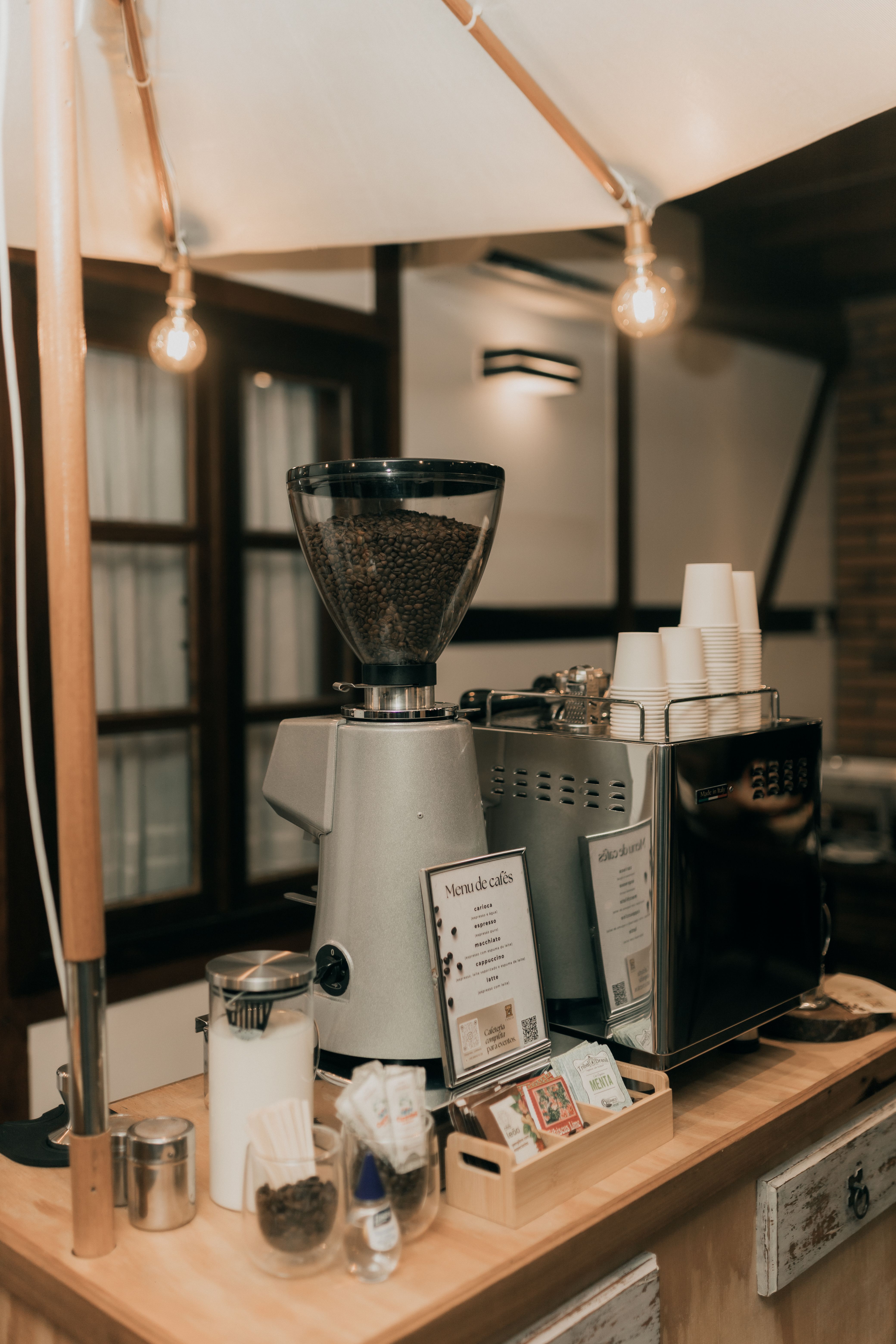 The warm interior of Marna Coffee with its espresso machine and counter