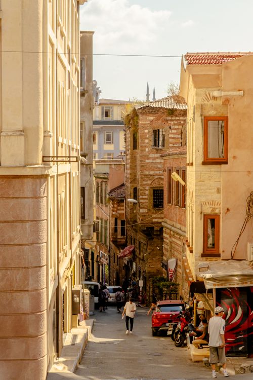 Free Explore a picturesque street in Beyoğlu, Istanbul, showcasing historic architecture and vibrant city life. Stock Photo