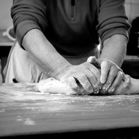 Hands shaping bread dough by letizia on Pexels