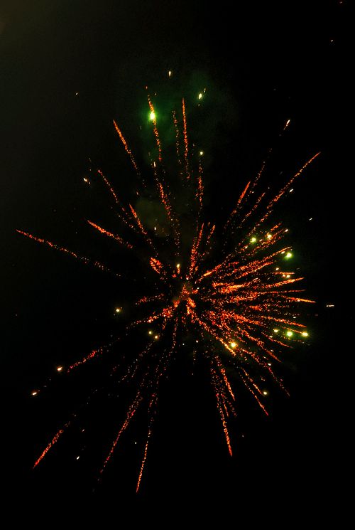 Free Captivating burst of fireworks illuminating the night sky with vivid colors. Stock Photo