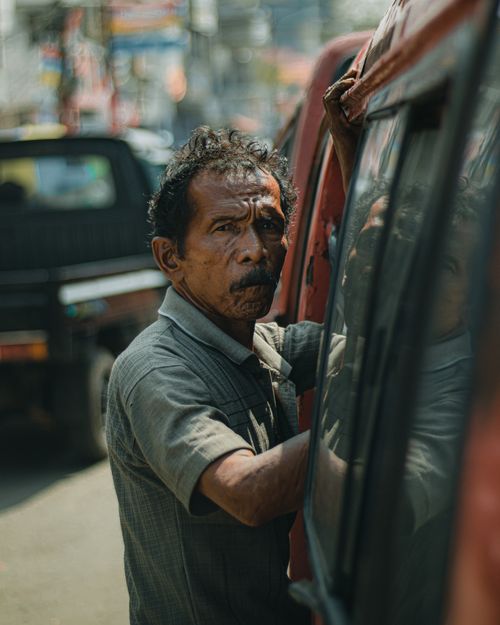 Free Portrait of a male street vendor in Banten, Indonesia, showcasing daily life. Stock Photo