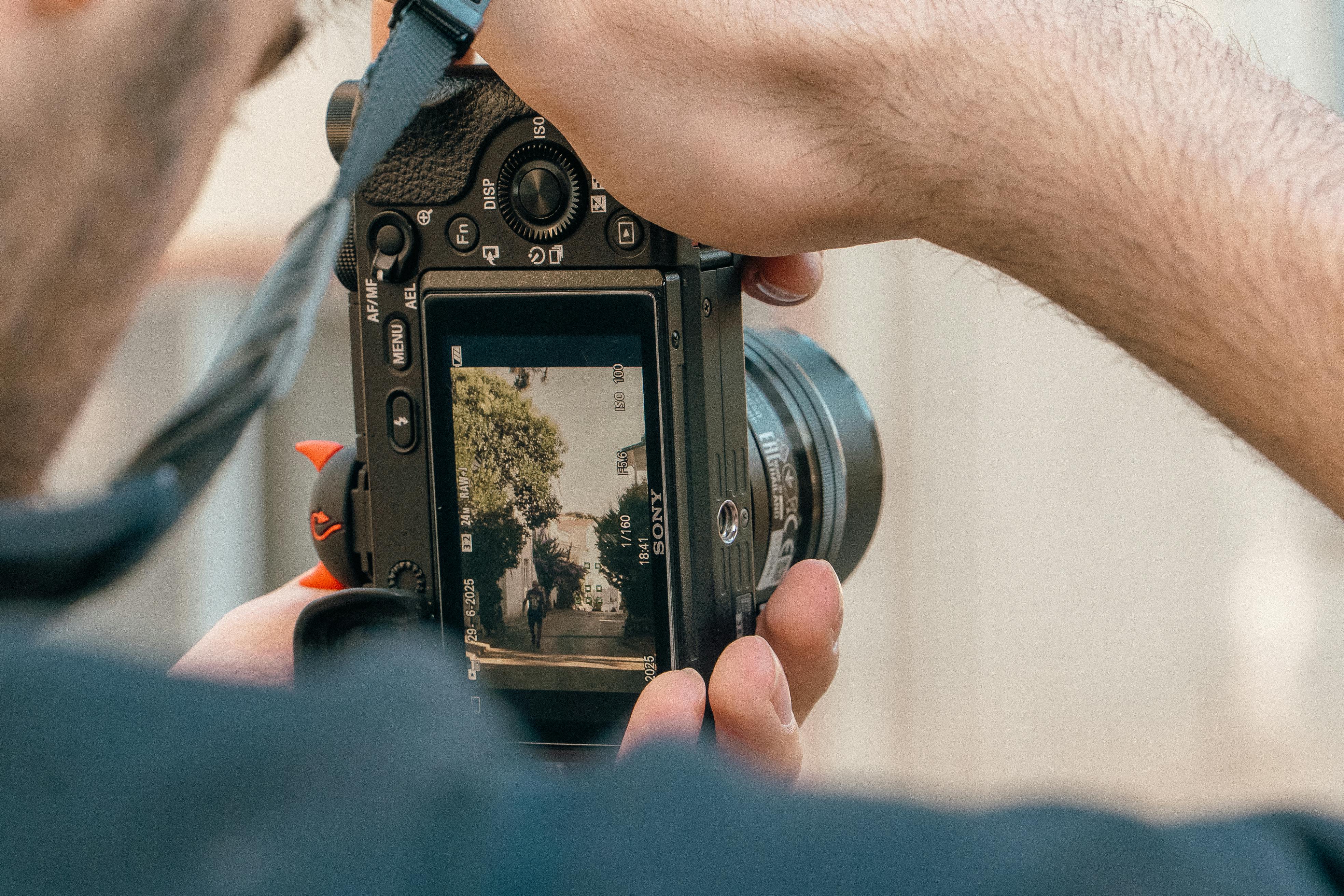 Free Close-up of camera screen showing a street scene in daylight. Stock Photo