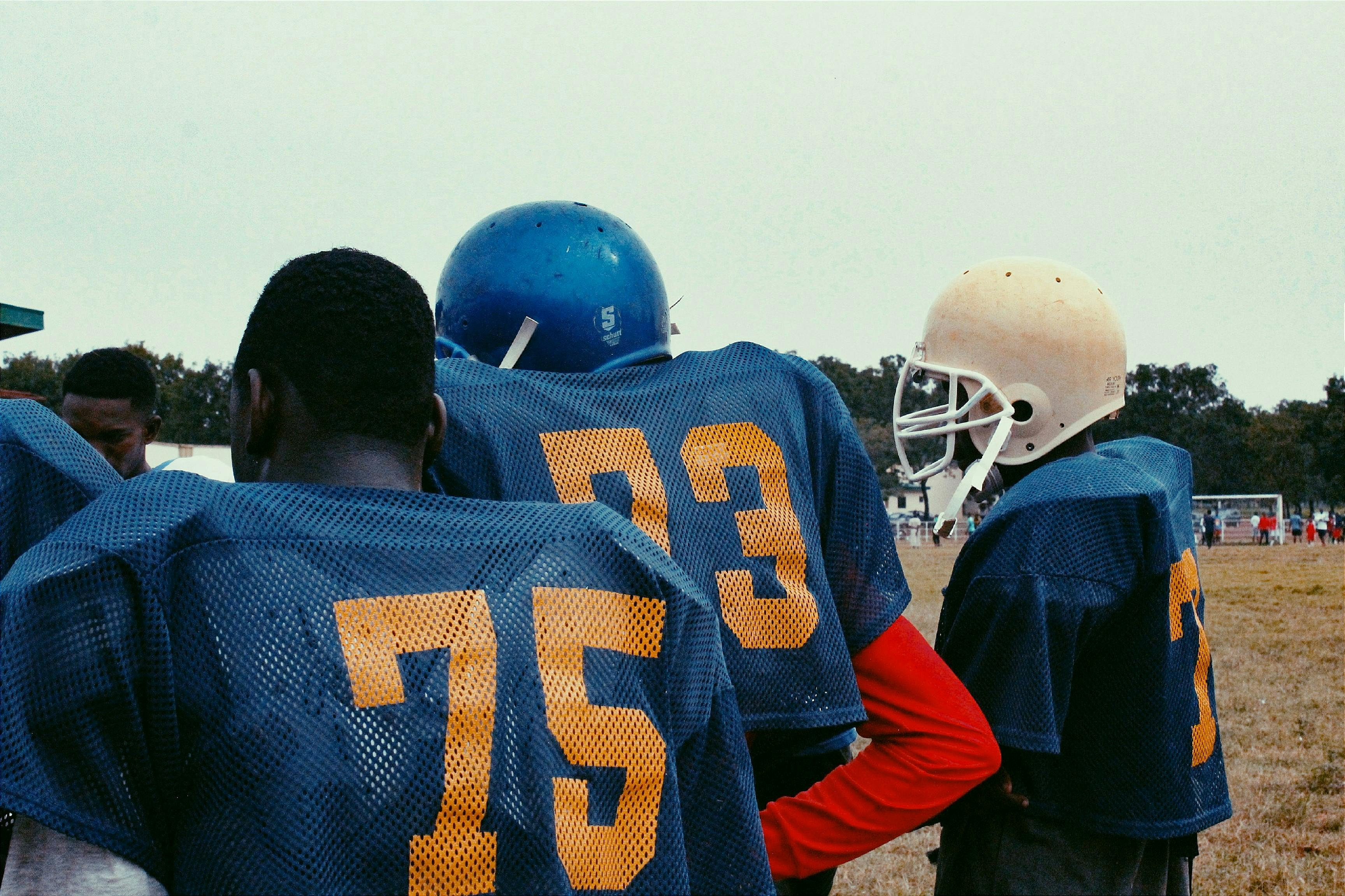 american football players on sports field