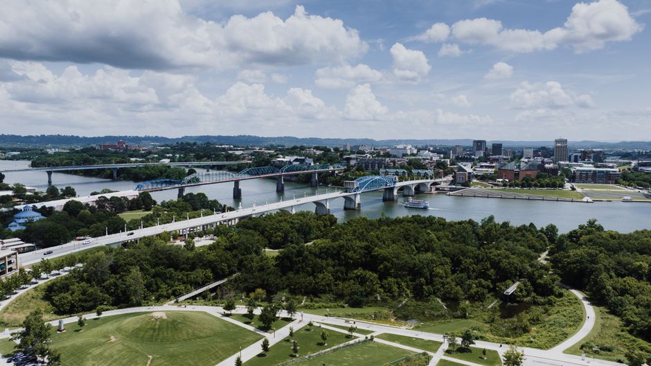 Unforgettable Scenic Helicopter Tour of Wears Valley, Tennessee Review 2026 - Stunning aerial view of Chattanooga's iconic bridges and skyline over the Tennessee River.