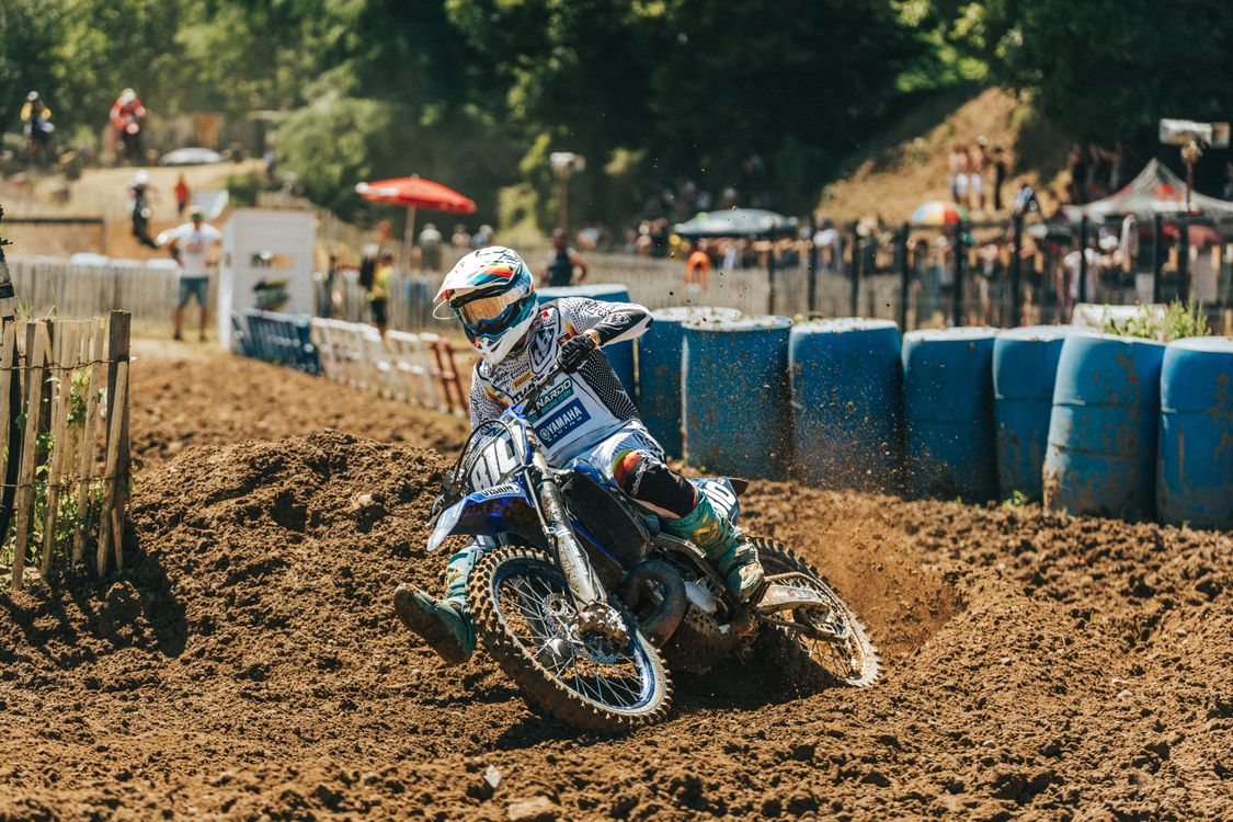French Motorcross Racers Thrilling Motocross Action at French Dirt Track · Free Stock Photo