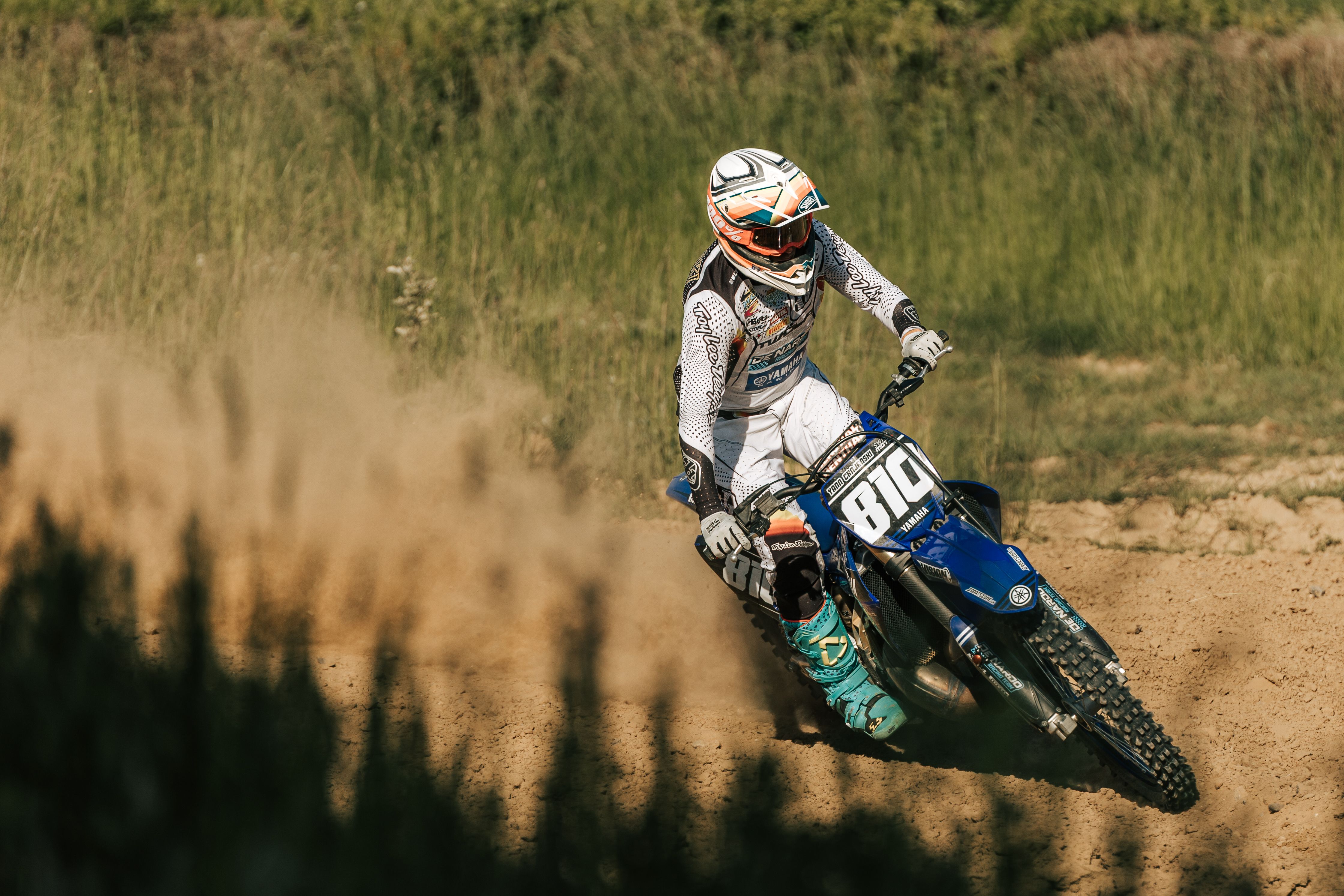 Dynamic Motocross Rider Racing on Dirt Track in France · Free Stock Photo