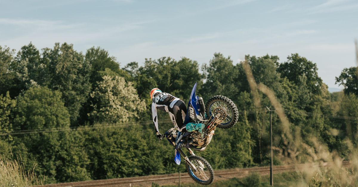 French Stunt Rider Exciting Dirt Bike Stunt in French Countryside · Free Stock Photo