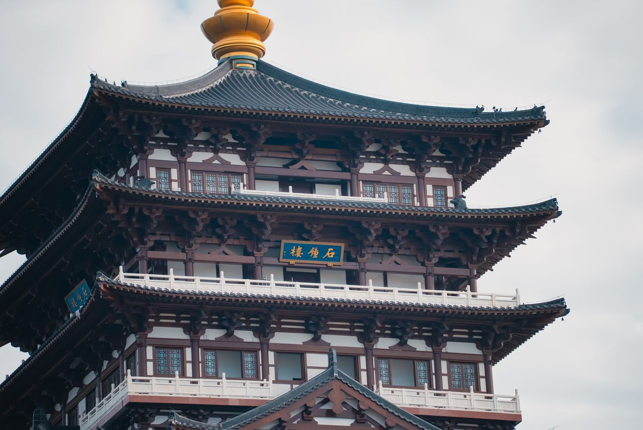 close up view of a traditional asian pagoda showcasing detailed wooden
