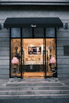 Entrance of a stylish gelato shop showcasing unique designs and inviting display.