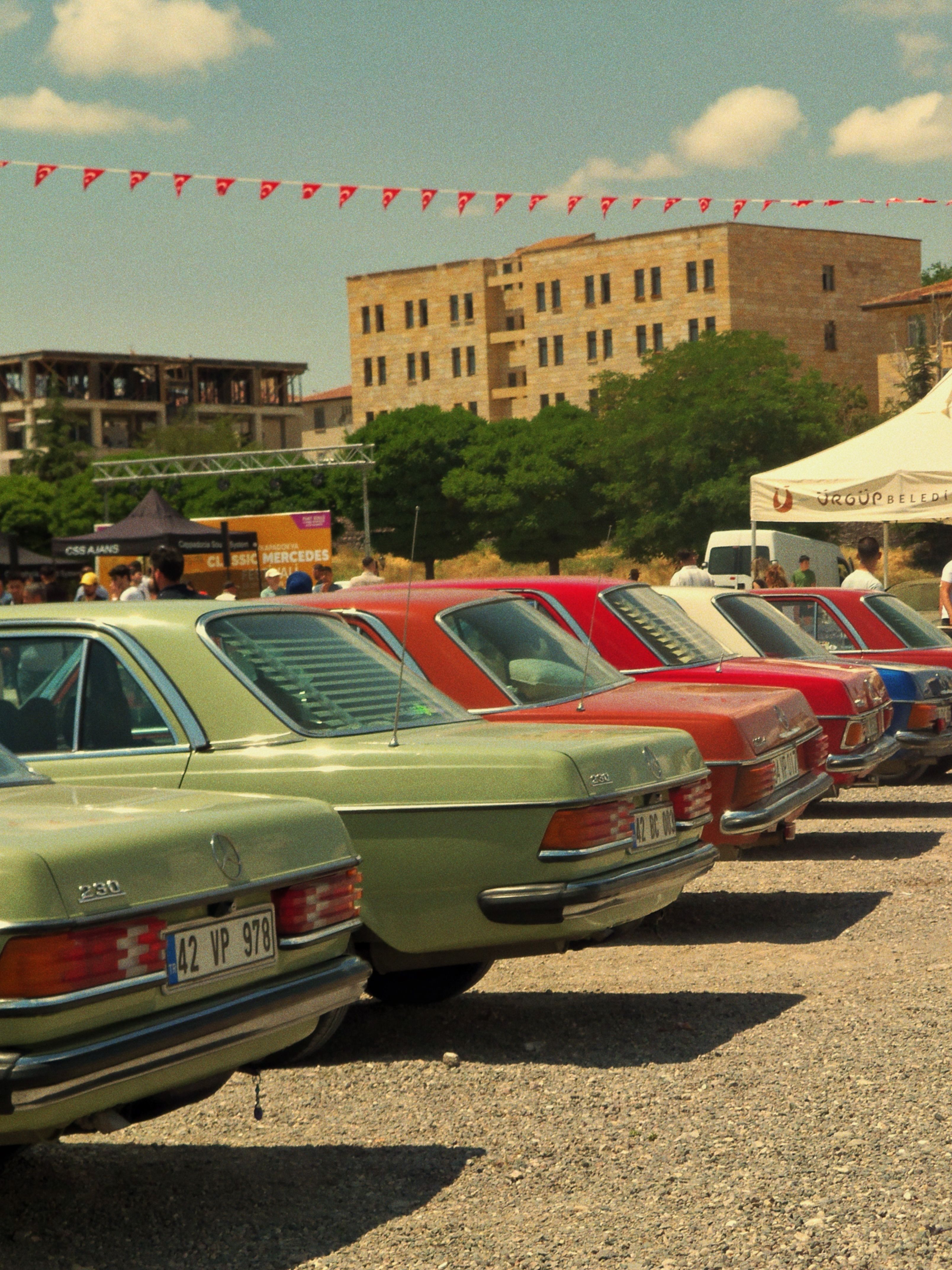 Vintage Cars Lined Up at Outdoor Event · Free Stock Photo