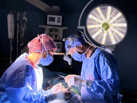 Professional surgical team in action in an operating room with focus on precision and teamwork.
