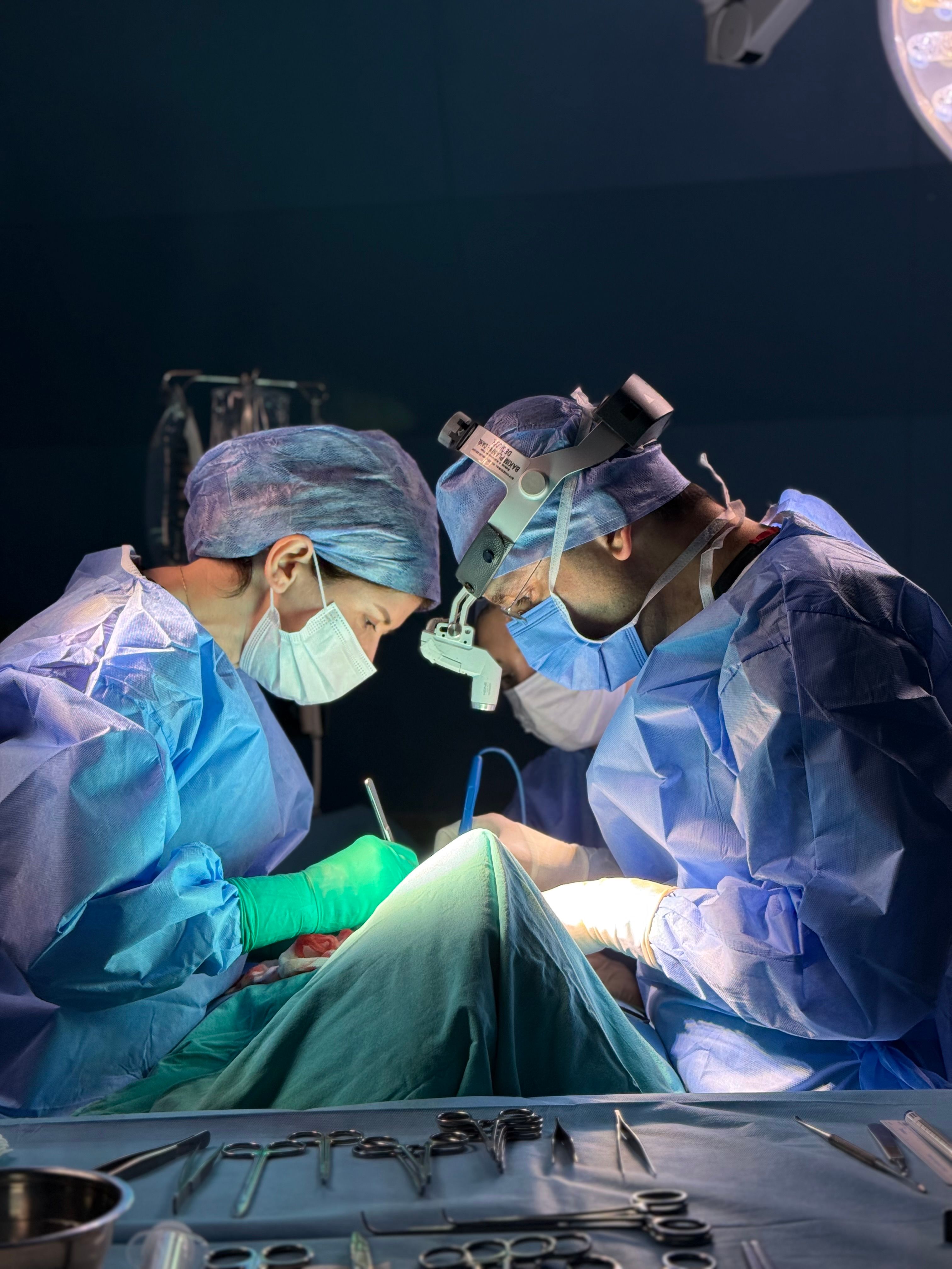 Surgical Team Performing an Operation in Hospital · Free Stock Photo