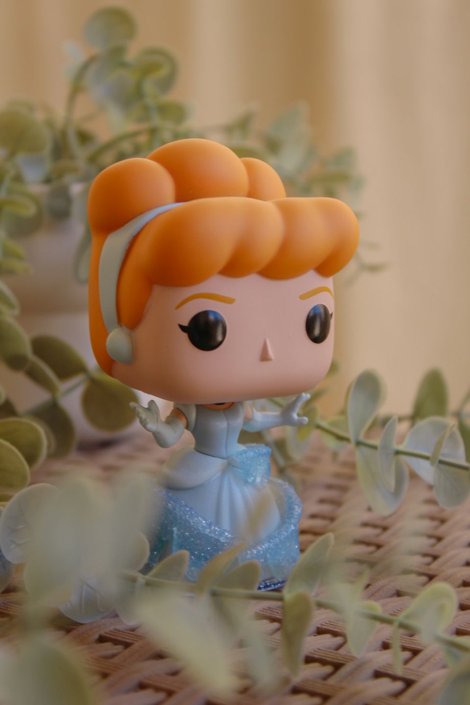 Small collectible toy photographed in soft light
