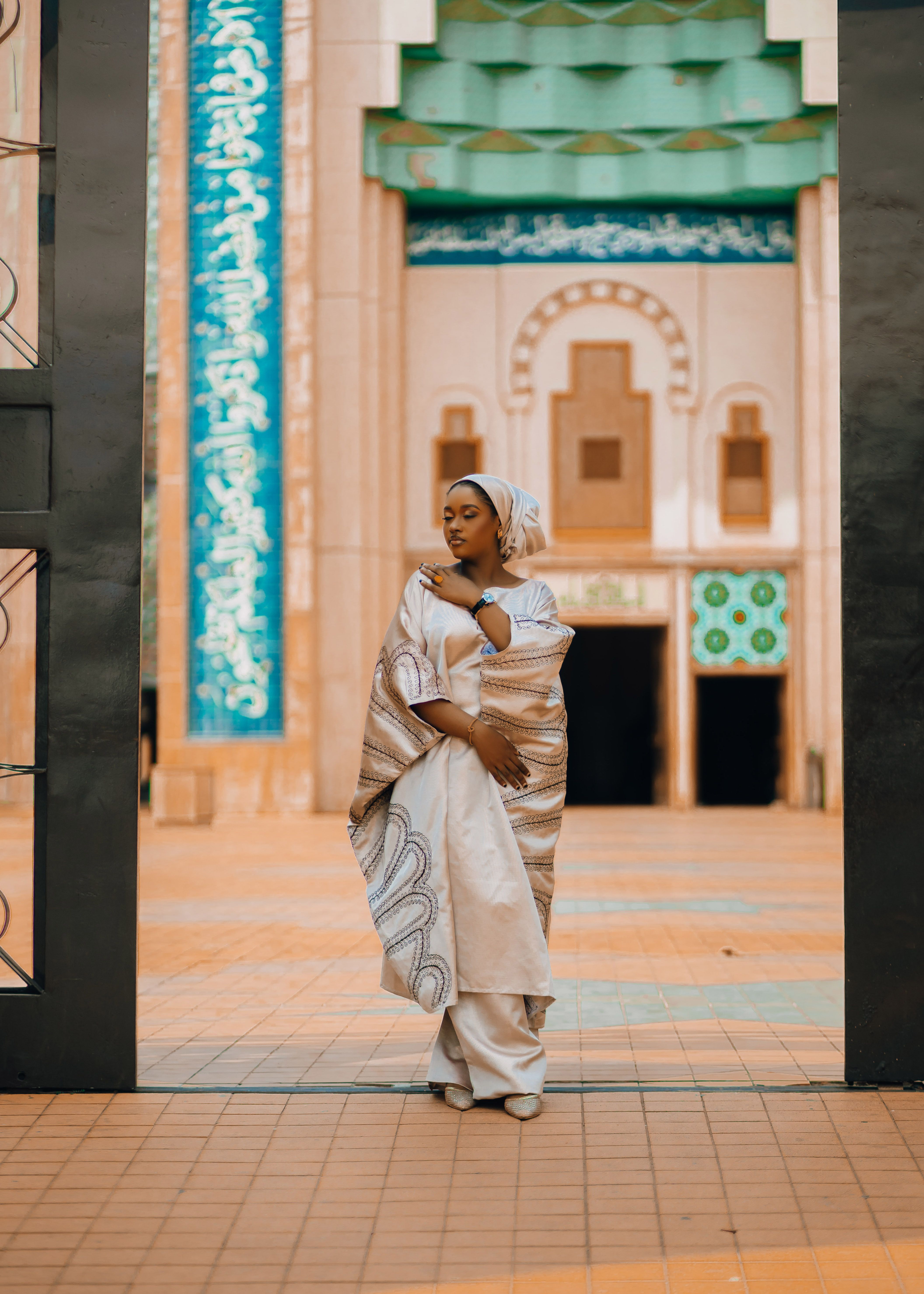 Woman in Traditional Dress Posing Outdoors · Free Stock Photo