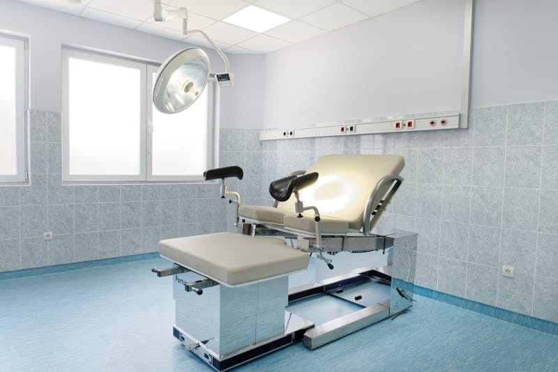 Modern medical examination room with contemporary equipment