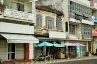 Charming Street Scene with Outdoor Cafés in Vietnam