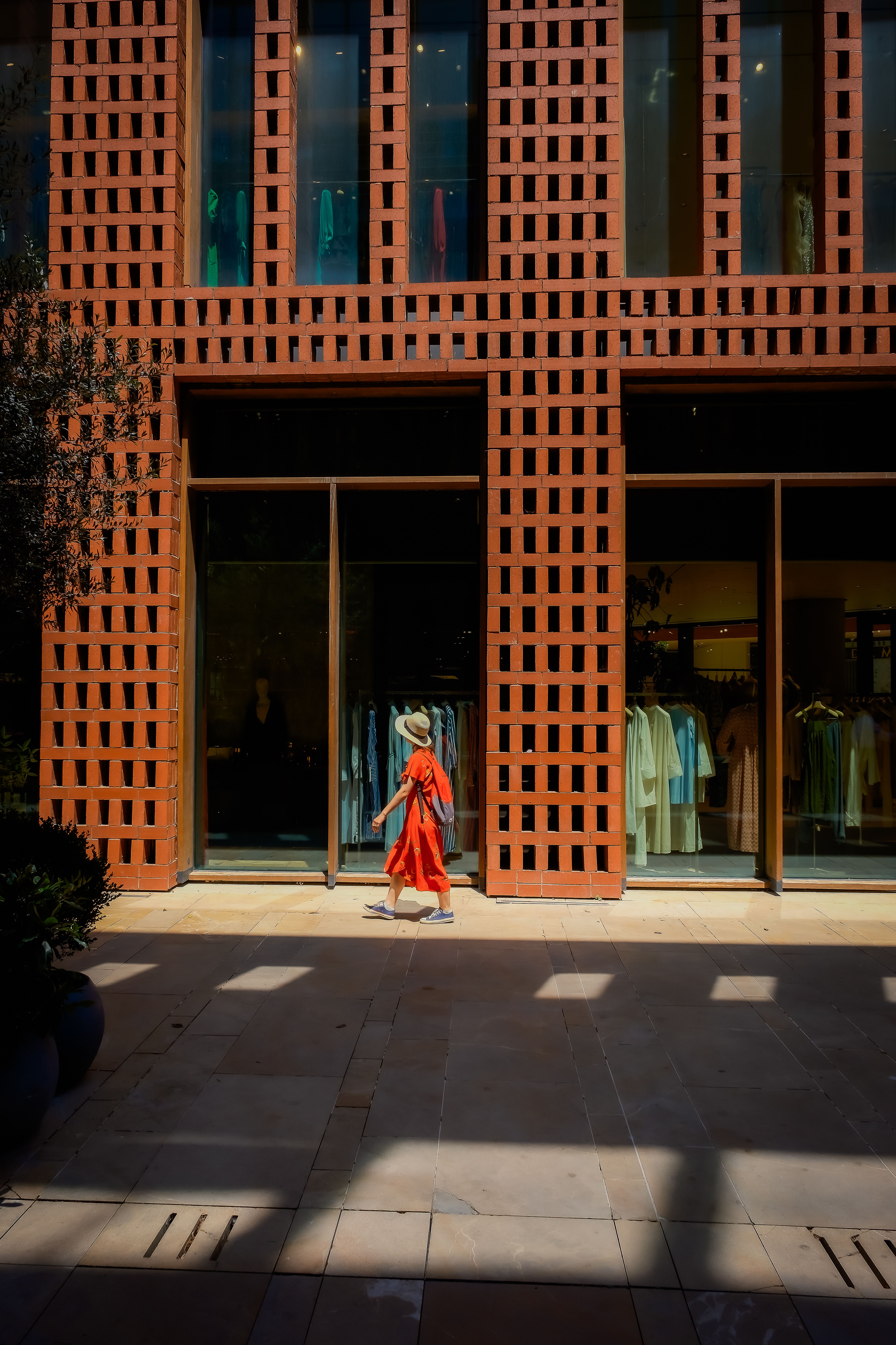 Woman Walking in Front of Modern Istanbul Storefront · Free Stock Photo