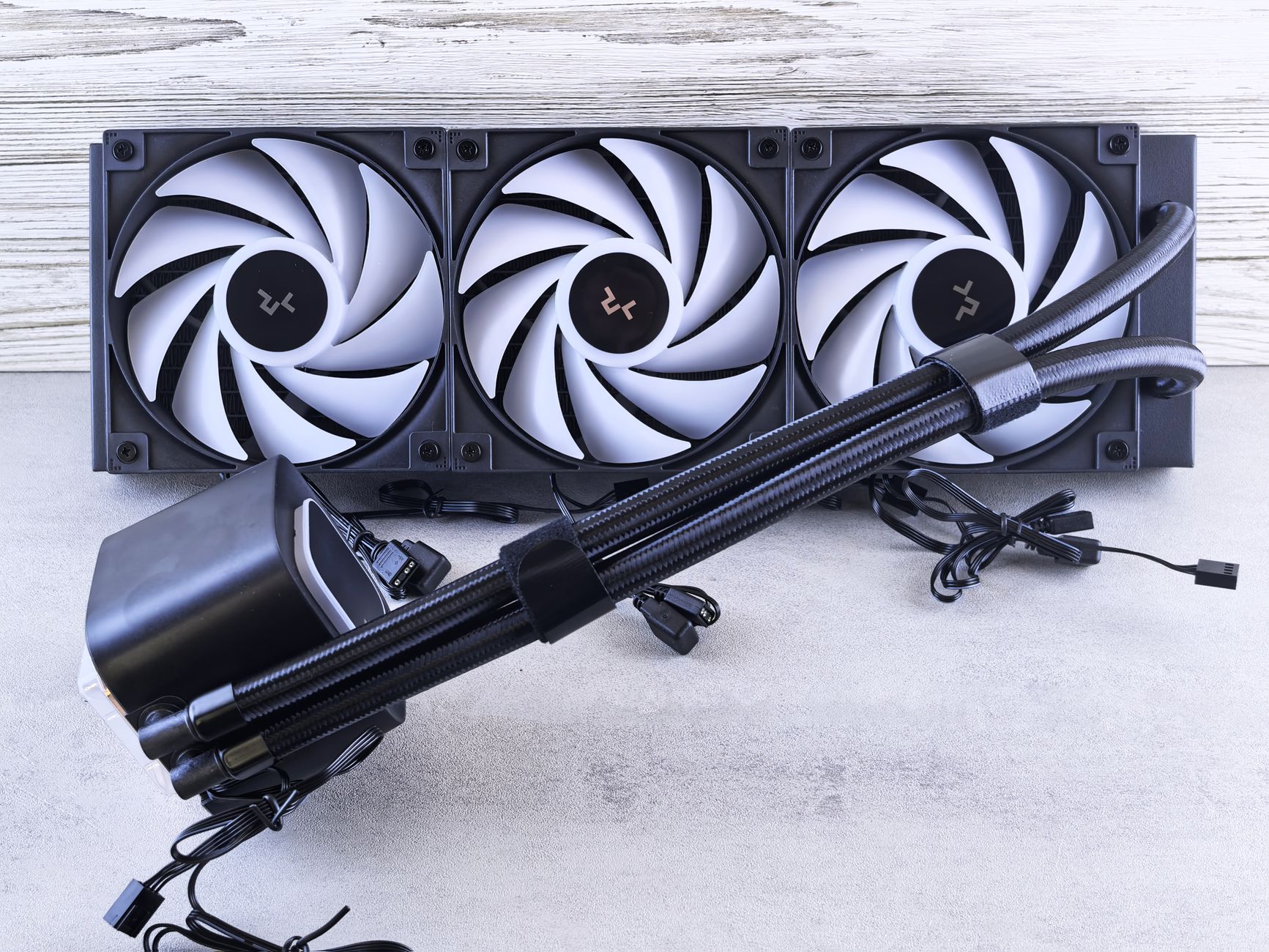 High-end liquid CPU cooler with triple fan setup, perfect for PC enthusiasts and gamers.
