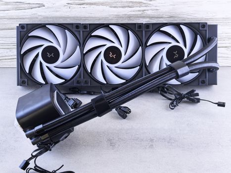 High-end liquid CPU cooler with triple fan setup, perfect for PC enthusiasts and gamers.