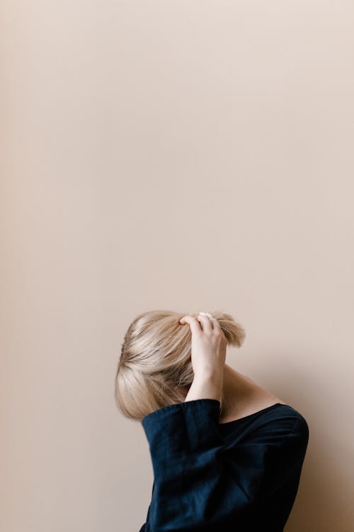 Free Woman With Blonde Hair Wearing Blue  Stock Photo