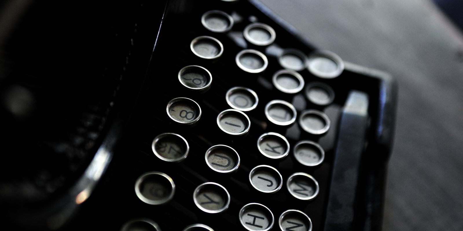 A close-up of typewriter keys