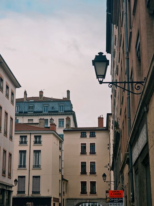 Free Street view showcasing vintage architecture in a European city. Stock Photo