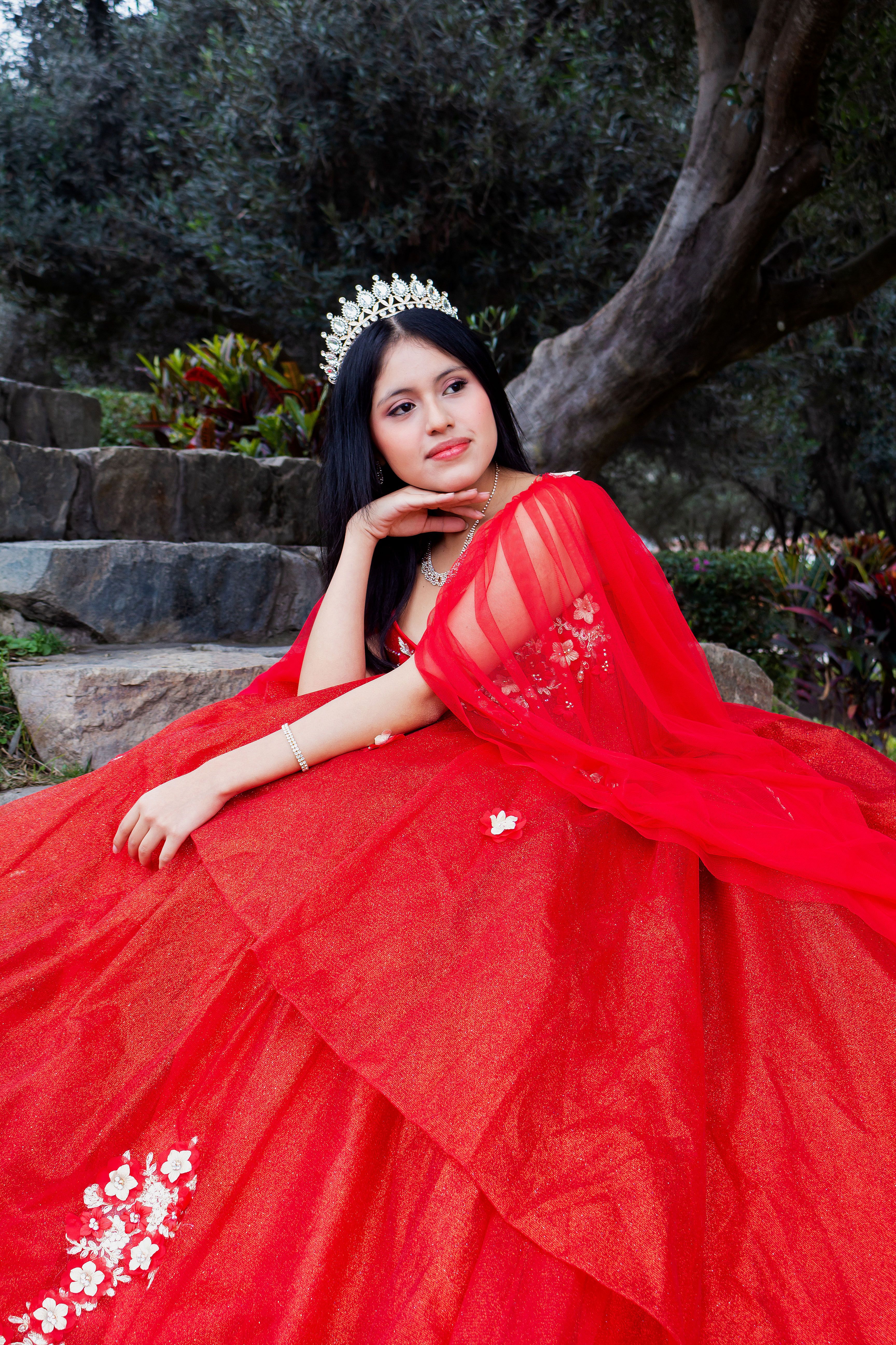 Elegant Young Woman in Red Dress Outdoors · Free Stock Photo