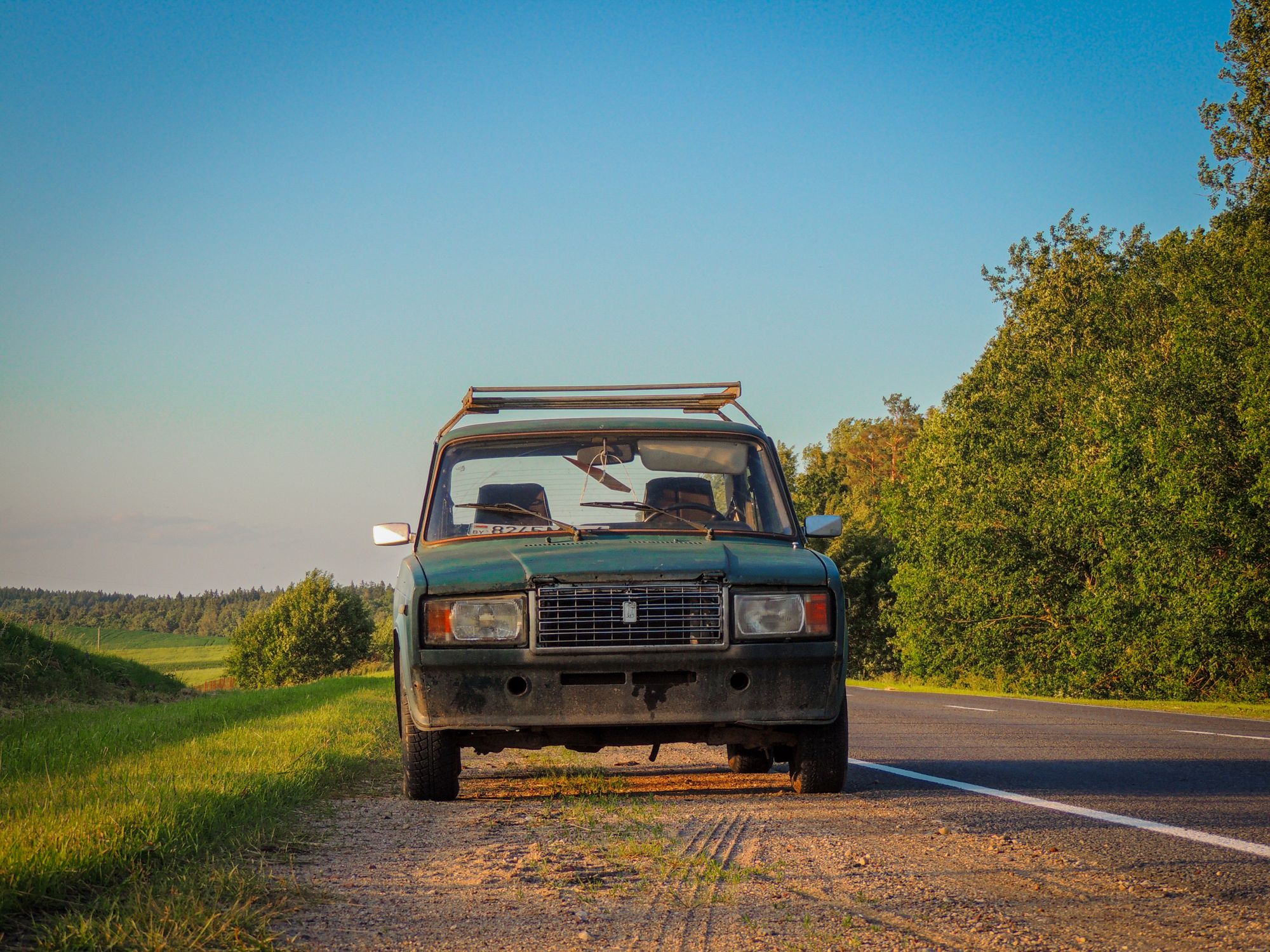 Car In Rural Setting Vintage Car on a Rural Country Road · Free Stock Photo