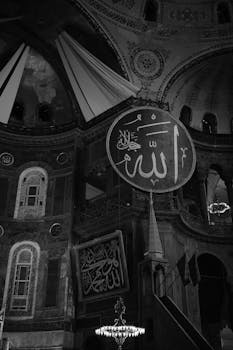 Black and white interior view of Hagia Sophia's intricate design in Istanbul.