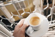 White Ceramic Mug With Brown Liquid