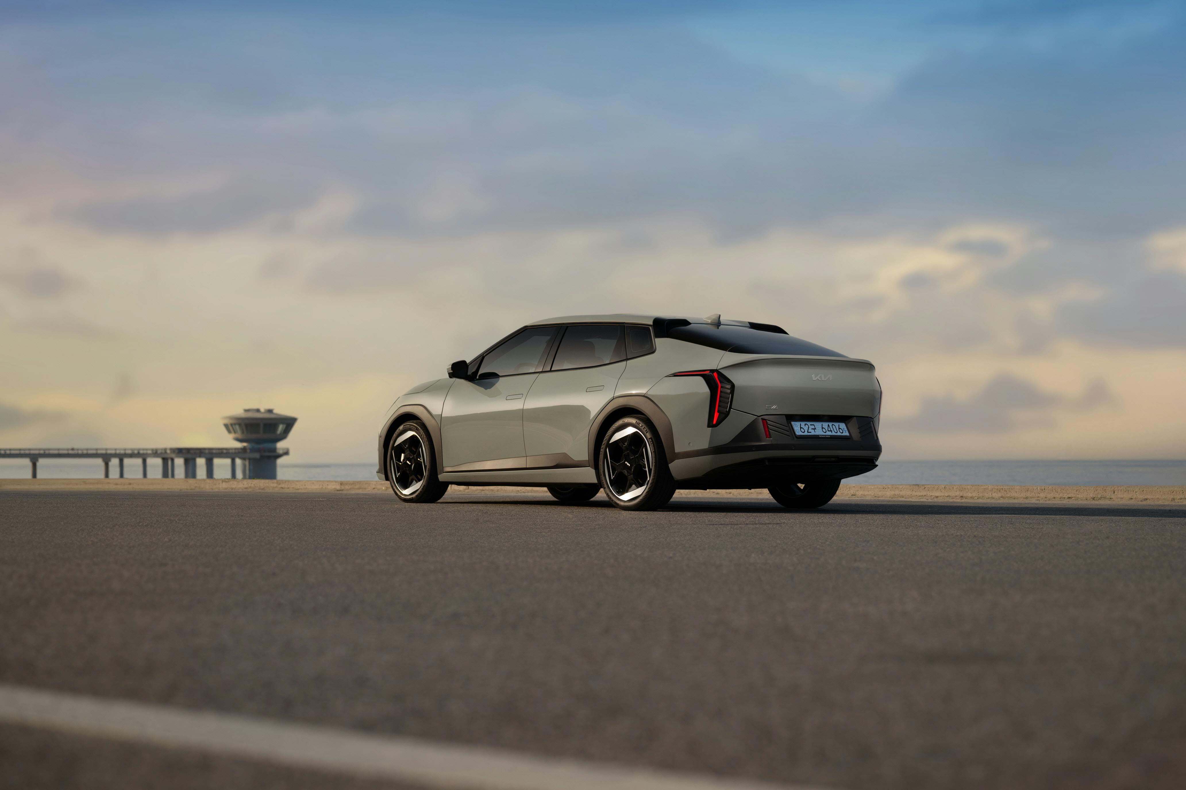Sleek Electric Vehicle on Scenic Coastal Road