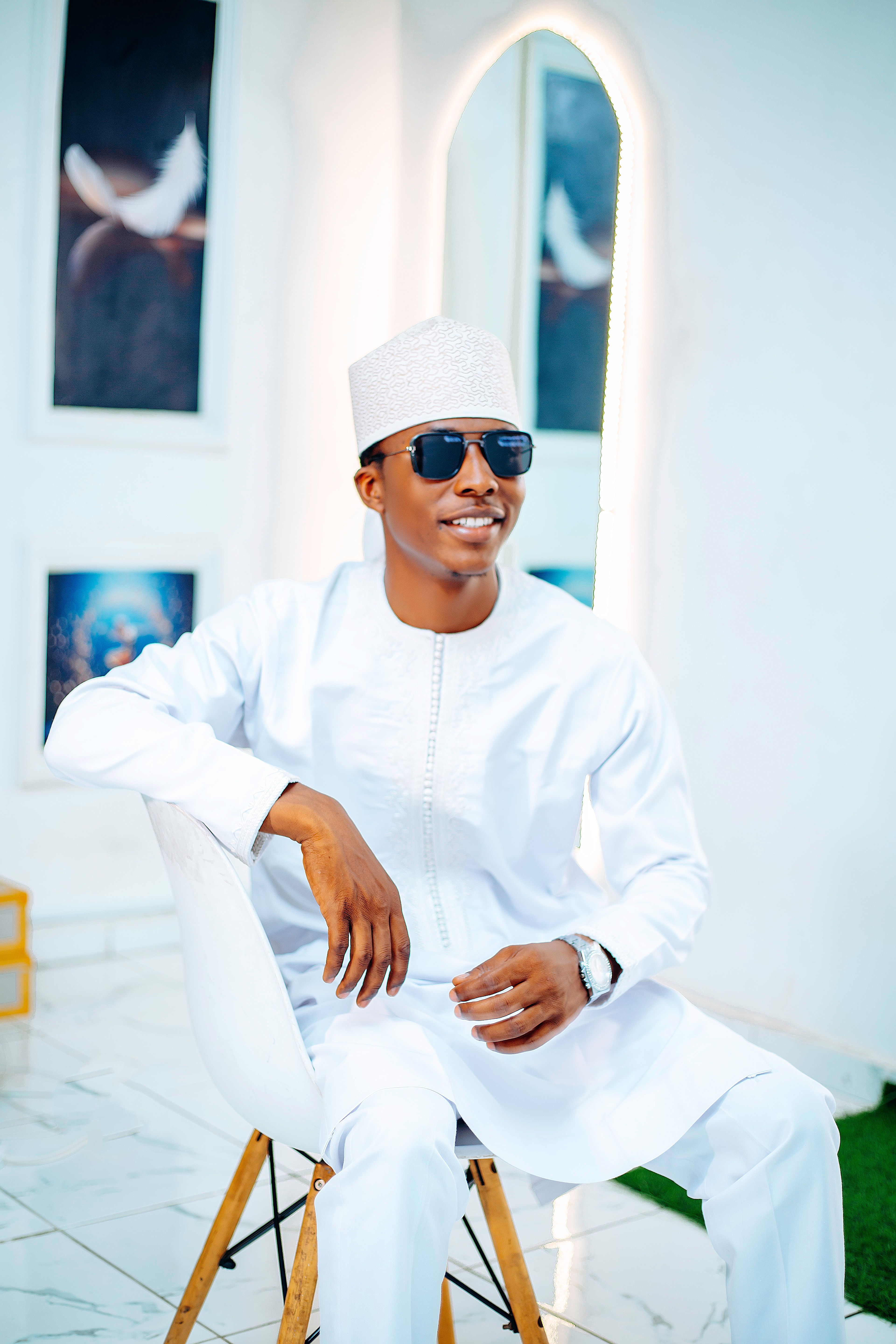 Portrait of Man in Traditional Attire in Art Gallery · Free Stock Photo