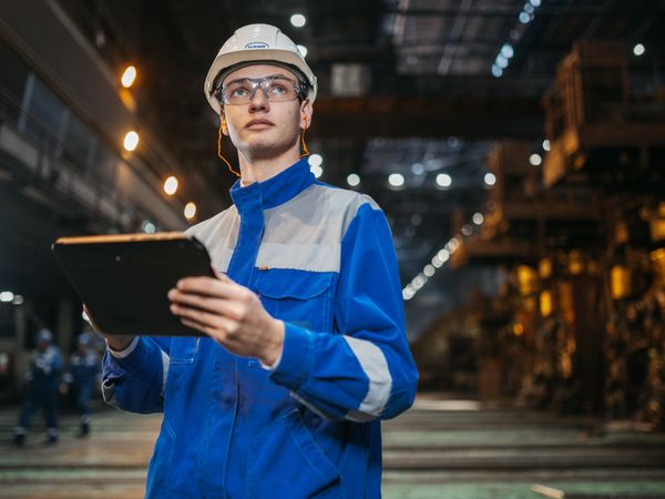 Engineer reviewing survey data on a tablet