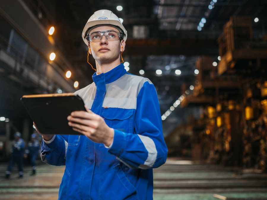 Engineer reviewing survey data on a tablet
