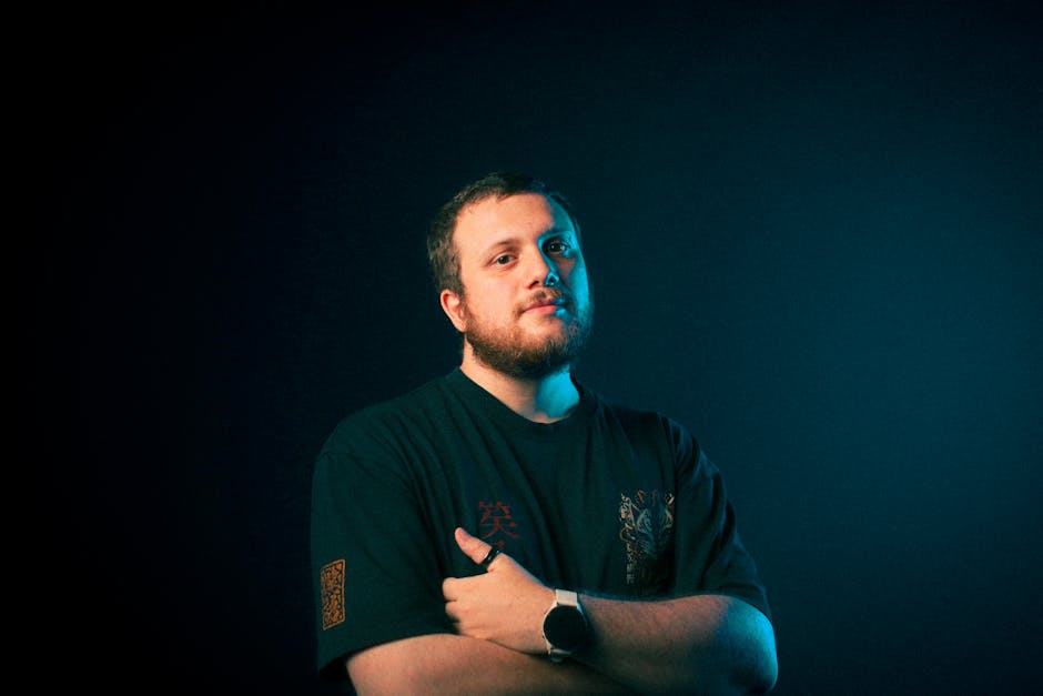 Samsung Galaxy Watch 7 vs Google Pixel Watch 3: Android Fitness Face-off (2024) Portrait of a confident man in dramatic lighting, conveying strength and determination.