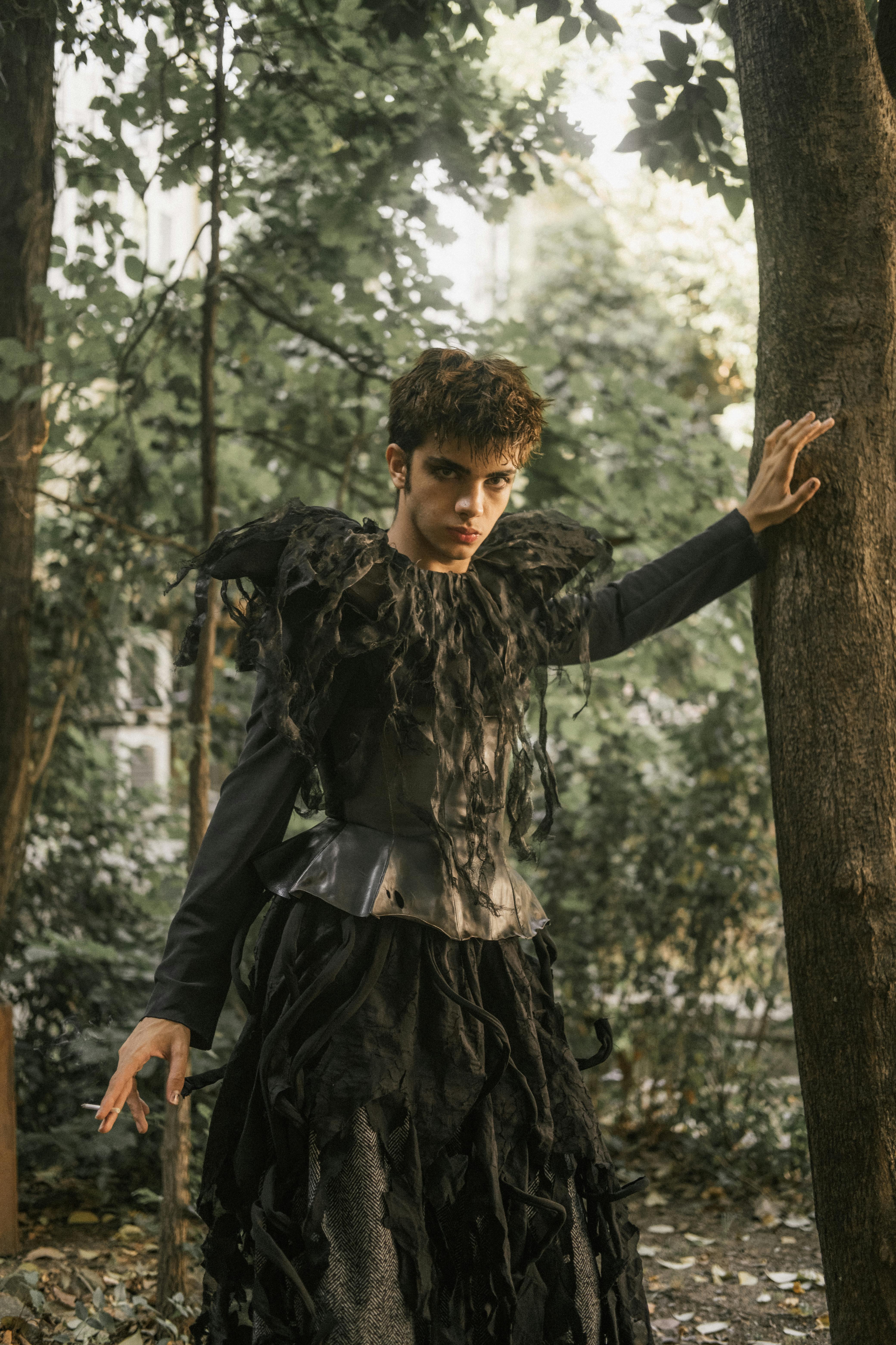 Free Striking portrait showcasing avant-garde fashion in a lush Istanbul setting. Stock Photo