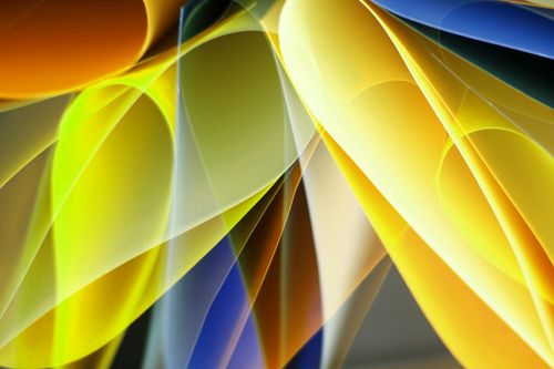 Free Colorful abstract artwork with wave-like patterns in yellow, blue, and orange hues. Stock Photo