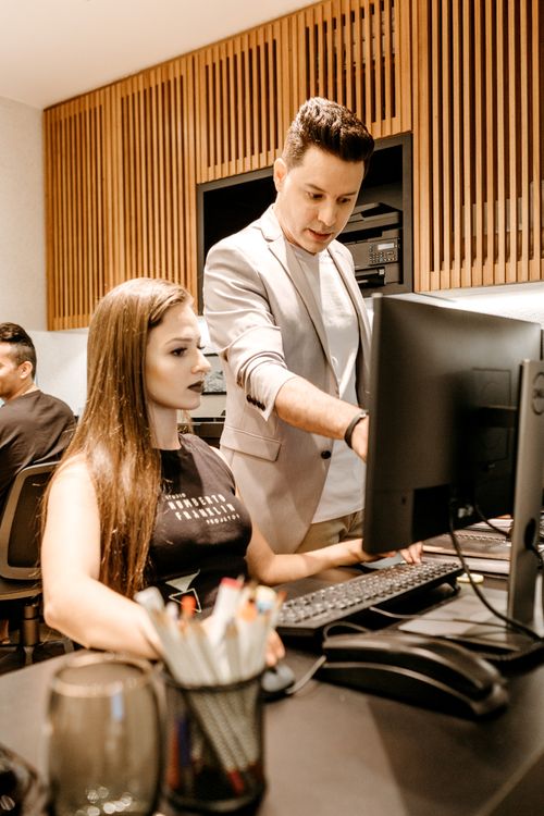 Woman and Man Using Computer · Free Stock Photo